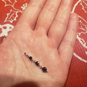 14K gold diamonds and sapphire pendant.